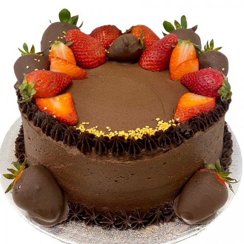 Chocolate cake with strawberries on top
