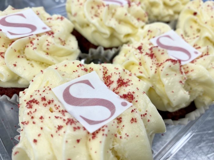 Red velvet cupcakes with printed initial
