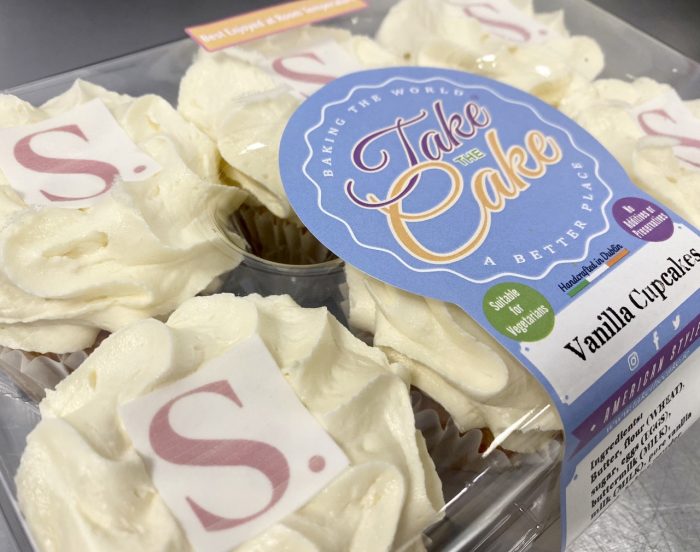 Packaged vanilla cupcakes with printed initial
